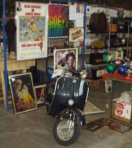 Piaggio Vespa and old movie posters