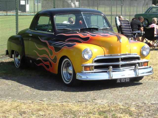 hot rod with flames on hood