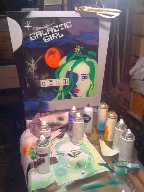 Galactic Girl custom pinball machine backbox being painted